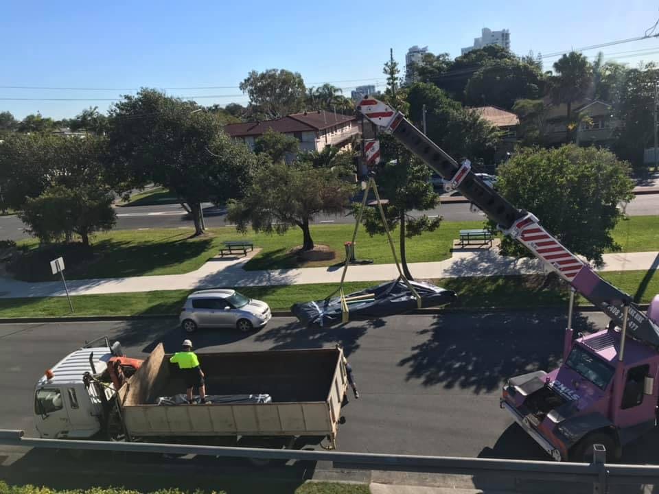 Why Using a Crane for Roof Replacement is a Game Changer