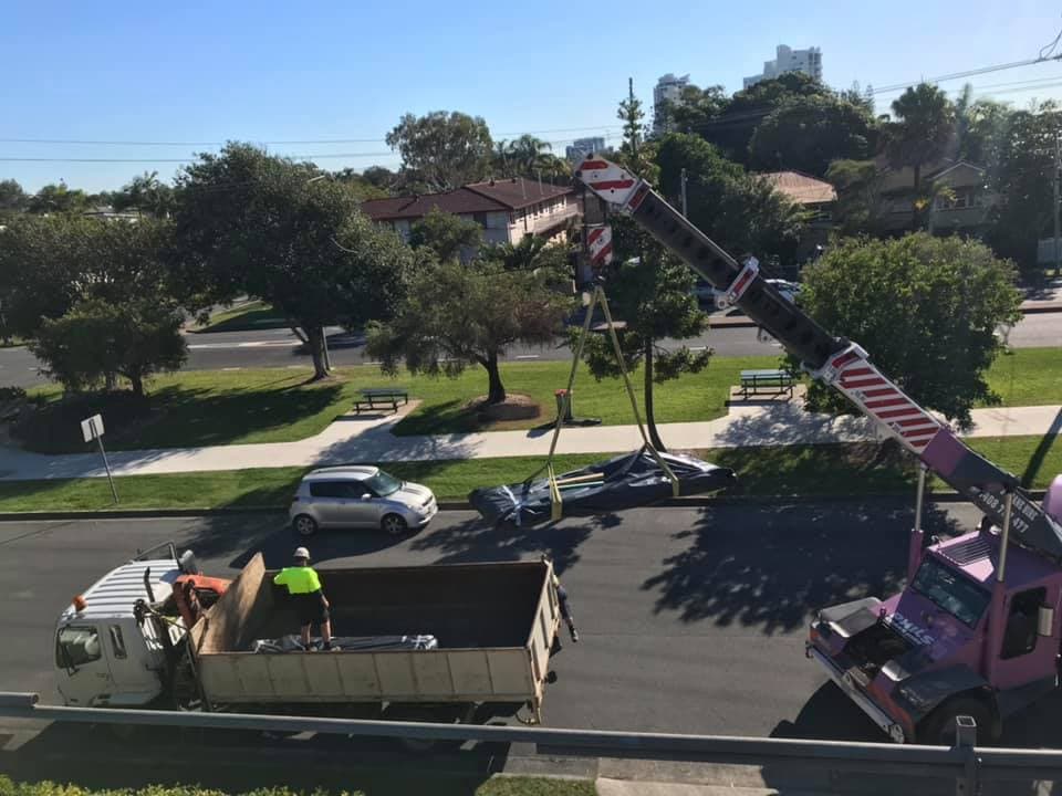 Why Using a Crane for Roof Replacement is a Game Changer - Metal roofing by Chris Board Metal Roofing