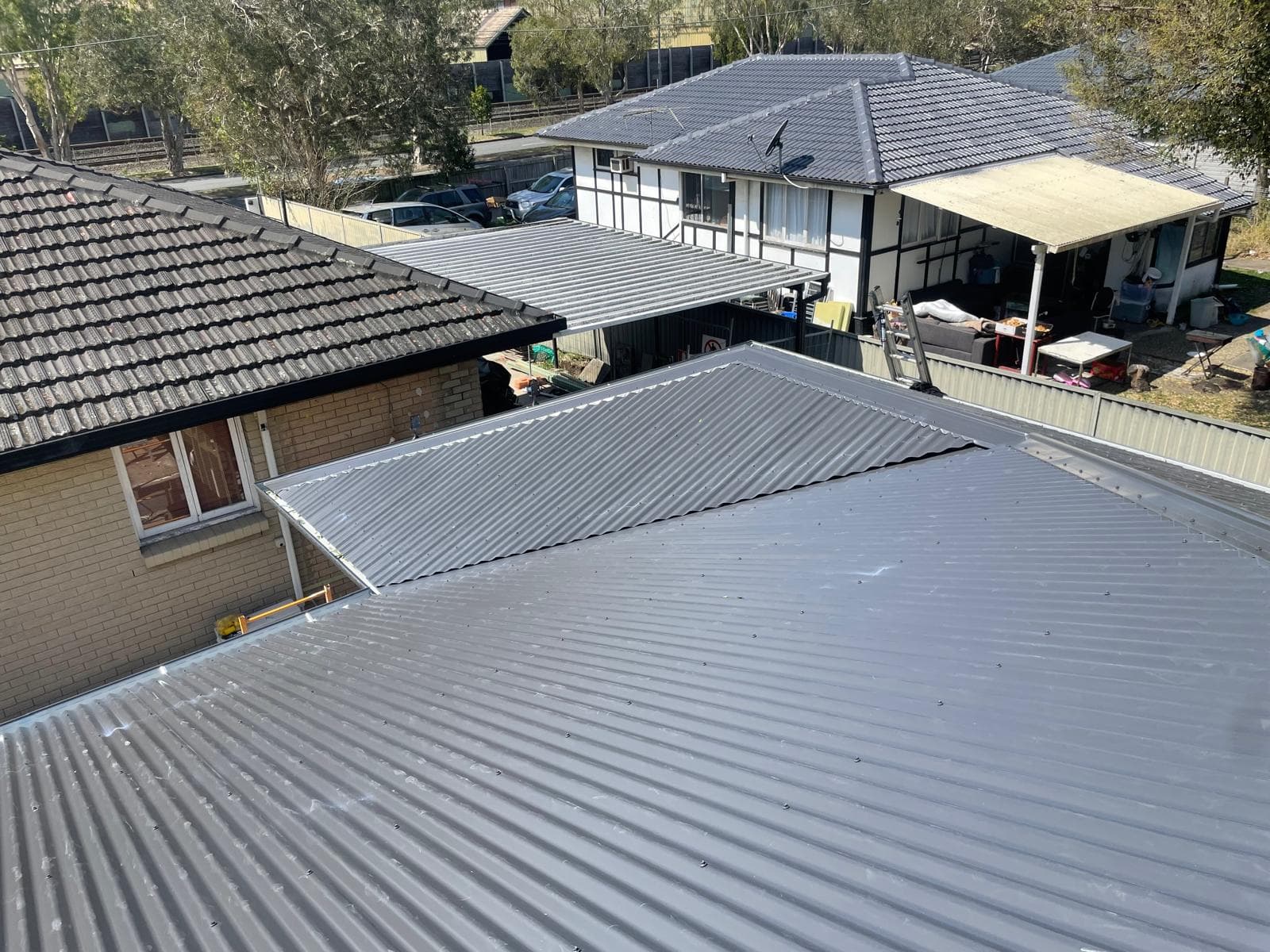 Detail view of new metal roof installation in Runcorn Brisbane showcasing expert craftsmanship by licensed Brisbane roofers