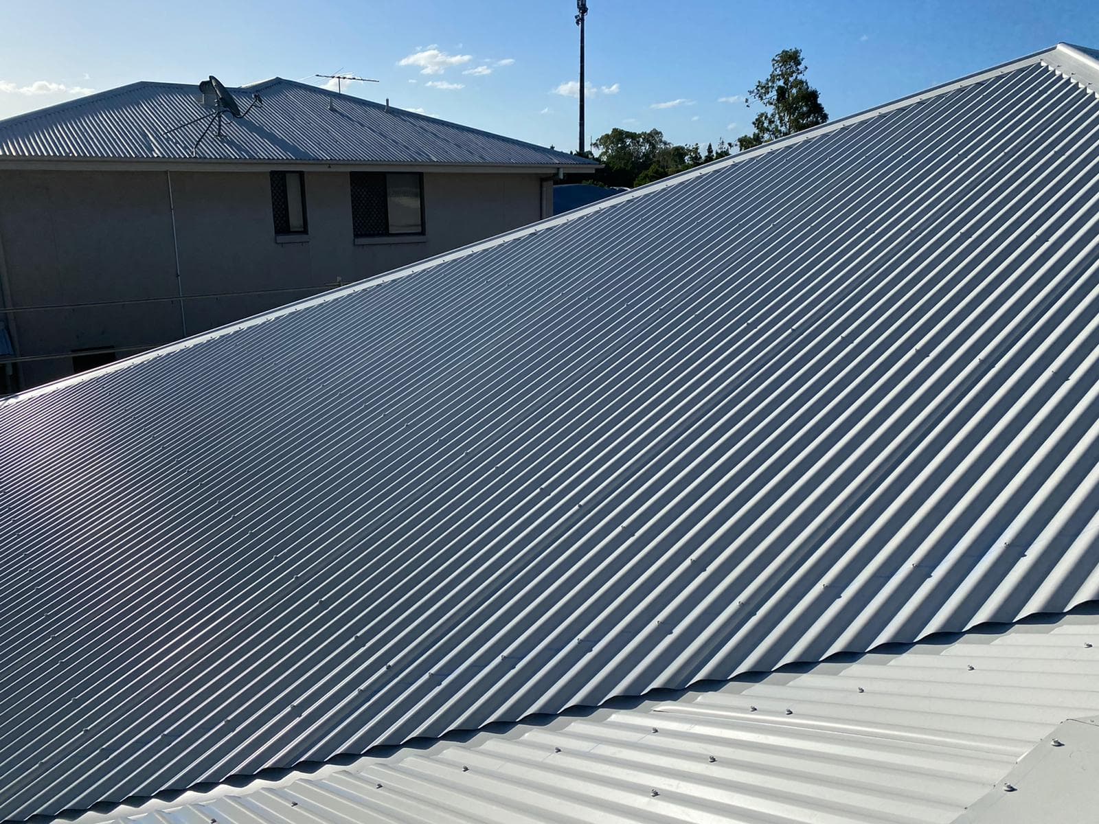 Modern Estate Home Roofing - Before and after roofing transformation in Springfield