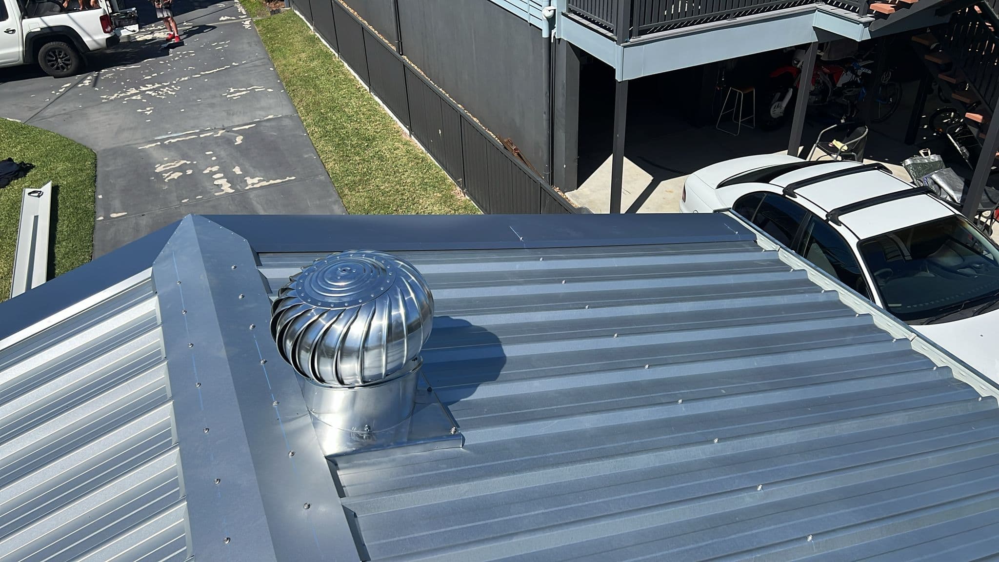 New roof ventilator fitted to the completed Colorbond roof in Lota, Brisbane