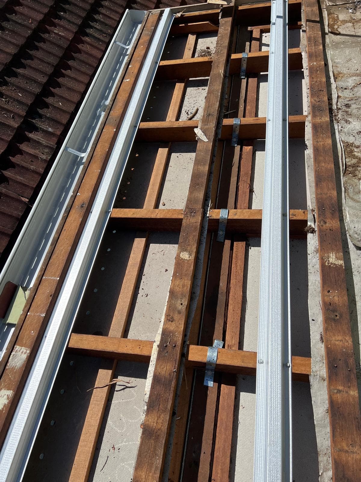 New Colorbond gutters installed with the new roof in The Gap, Brisbane