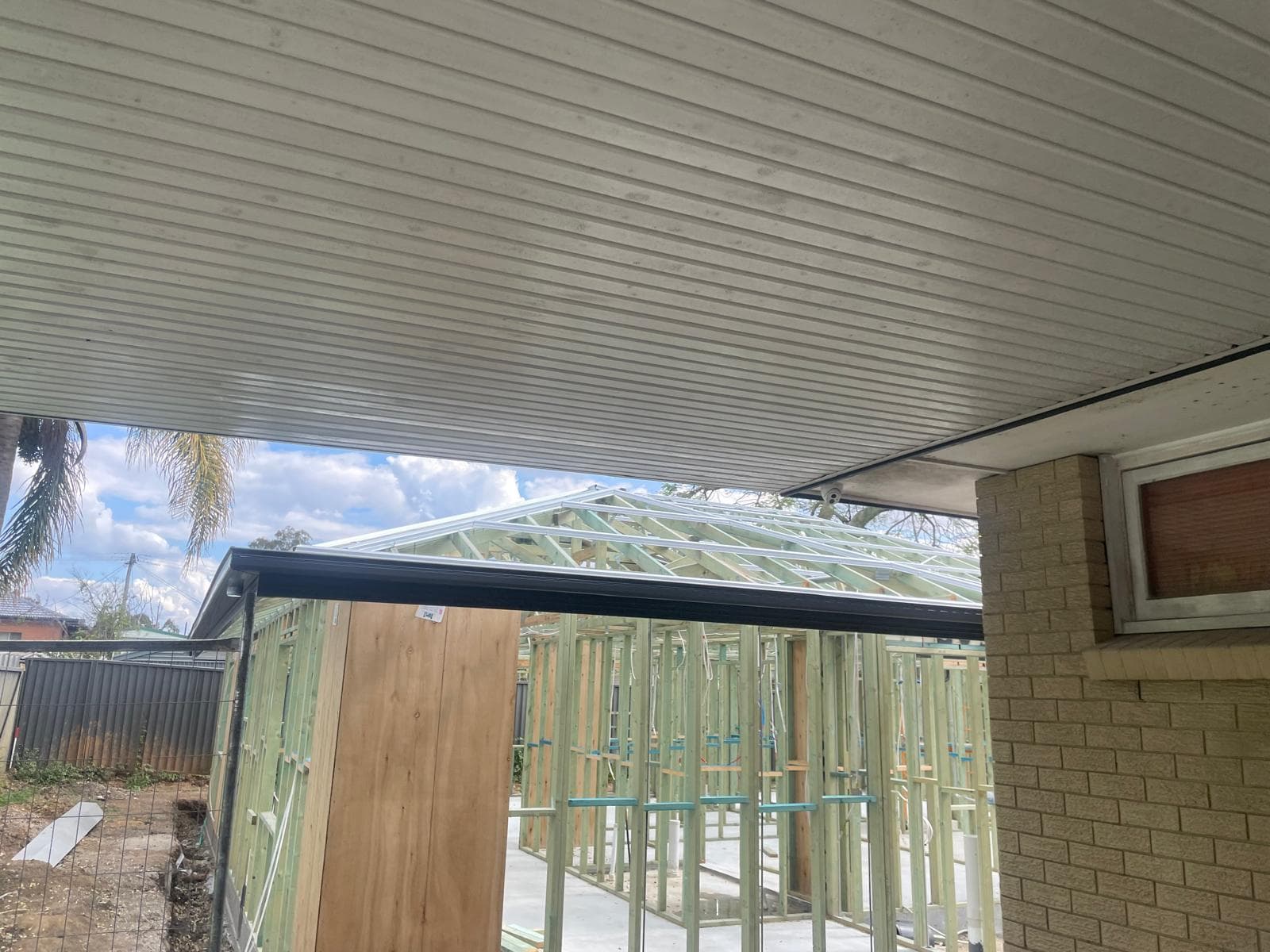 Professional fascia and gutter installation in Runcorn Brisbane complementing new metal roof by CBMR roofing specialists